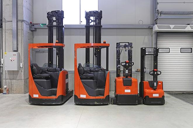 forklifts at work in a bustling warehouse